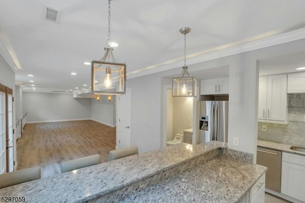 Interior, Kitchen, Pendant Lights, Recessed Lighting, Stainless Steel Appliances, Wood Texture Flooring