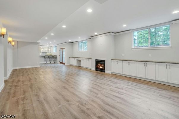 Empty room, Fireplace, Interior, Recessed Lighting, Wood Texture Flooring