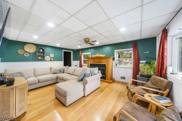 Fireplace, Interior, Living room, Recessed Lighting, Wood Texture Flooring