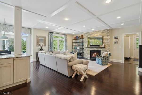 Fireplace, Interior, Living room, Recessed Lighting, Stone Walls, Wood Texture Flooring