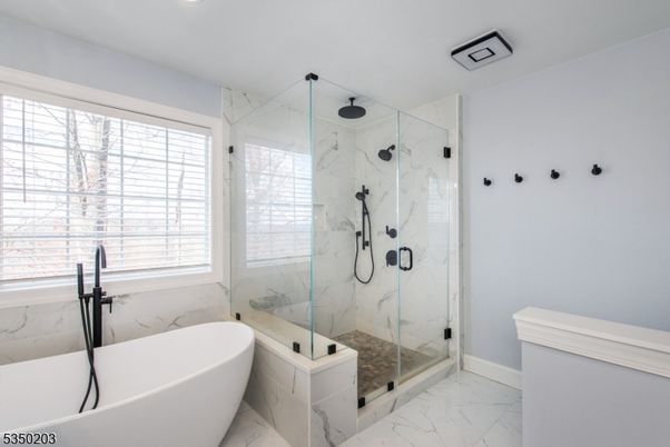 Bathroom, Free Standing Baths, Glass Shower, Interior, Marble, Marble Walls, Recessed Lighting