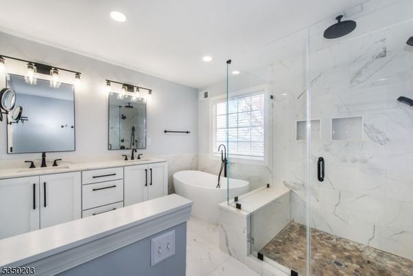 Bathroom, Dual Sink Vanities, Free Standing Baths, Glass Shower, Interior, Marble, Marble Walls, Recessed Lighting