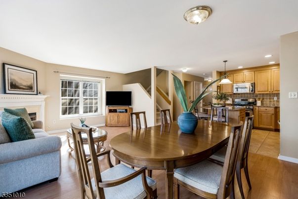 Dining room, Fireplace, Interior, Kitchen, Living room, Pendant Lights, Recessed Lighting, Wood Texture Flooring