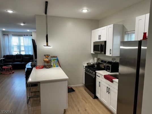 Interior, Kitchen, Living room, Pendant Lights, Recessed Lighting, Stainless Steel Appliances, Wood Texture Flooring