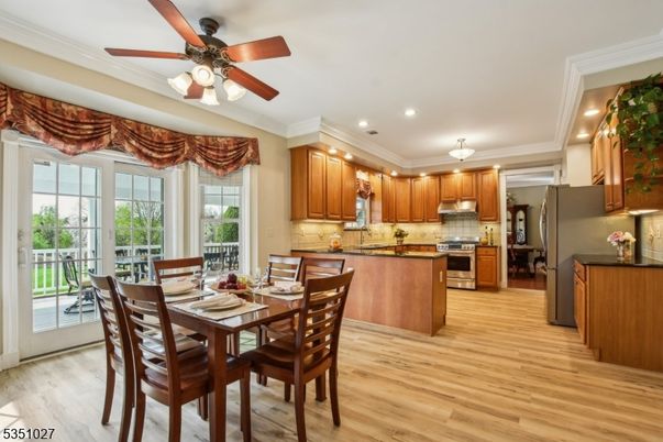 Dining room, Interior, Kitchen, Recessed Lighting, Stainless Steel Appliances, Wood Texture Flooring