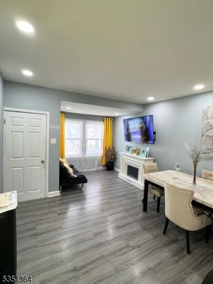 Fireplace, Home Office, Interior, Recessed Lighting, Wood Texture Flooring