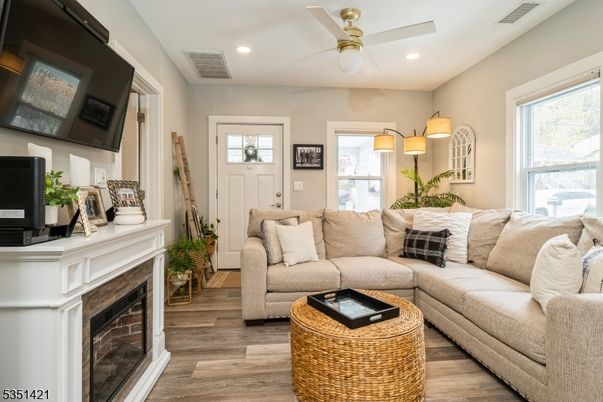 Fireplace, Interior, Living room, Recessed Lighting, Wood Texture Flooring