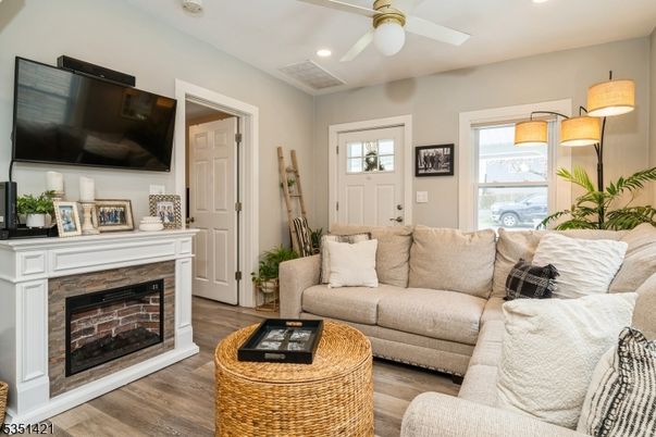 Fireplace, Interior, Living room, Recessed Lighting, Wood Texture Flooring