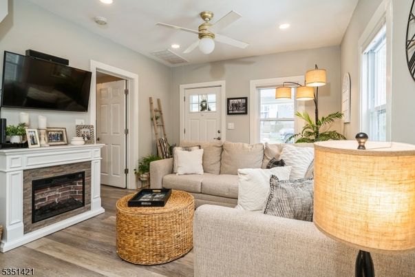Fireplace, Interior, Living room, Recessed Lighting, Wood Texture Flooring