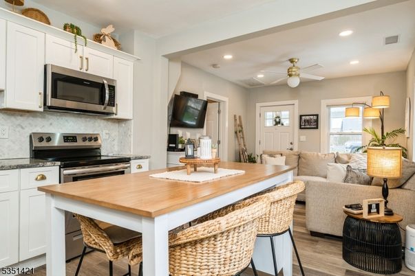 Interior, Kitchen, Living room, Recessed Lighting, Stainless Steel Appliances, Wood Texture Flooring