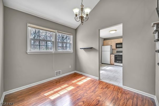 Chandelier, Empty room, Interior, Kitchen, Stainless Steel Appliances, Wood Texture Flooring