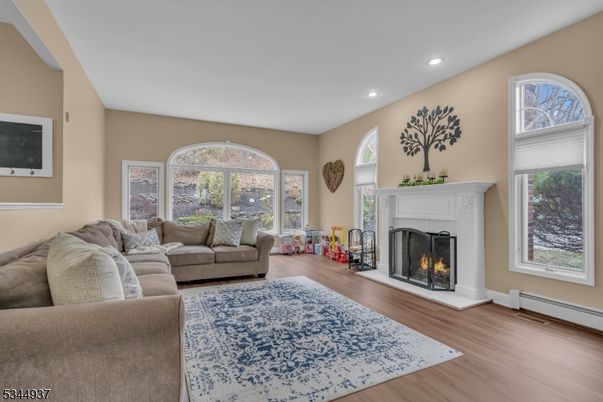 Fireplace, Interior, Living room, Recessed Lighting, Wood Texture Flooring