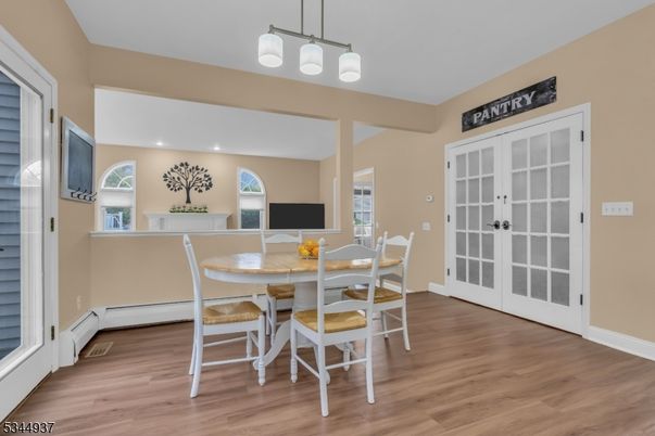Dining room, Interior, Pendant Lights, Recessed Lighting, Wood Texture Flooring
