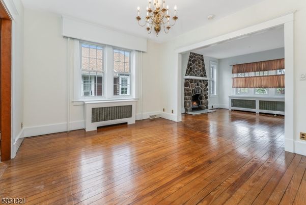 Chandelier, Empty room, Fireplace, Interior, Wood Texture Flooring
