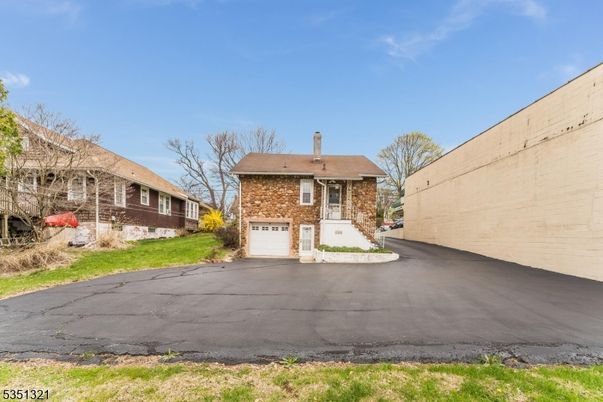Attached, Exterior, Facade, Brick Facade, Cape Cod