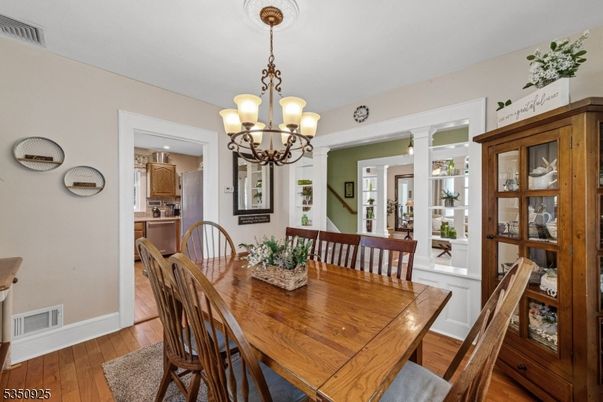 Chandelier, Dining room, Interior, Wood Texture Flooring