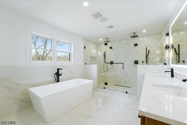 Bathroom, Dual Sink Vanities, Free Standing Baths, Glass Shower, Interior, Marble, Marble Walls, Recessed Lighting