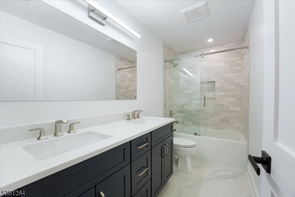 Bathroom, Dual Sink Vanities, Glass Shower, Interior, Marble, Recessed Lighting