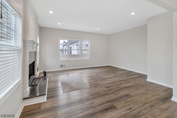 Empty room, Fireplace, Interior, Recessed Lighting, Wood Texture Flooring