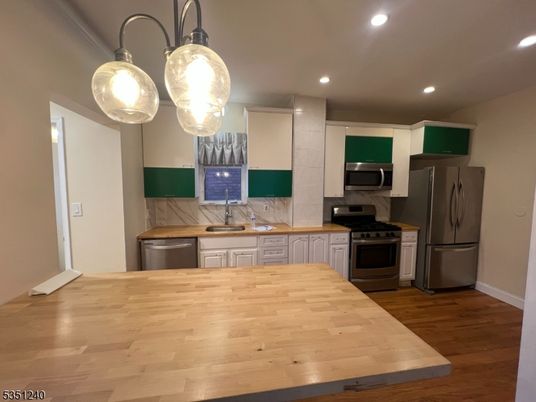 Interior, Kitchen, Pendant Lights, Recessed Lighting, Stainless Steel Appliances, Wood Texture Flooring