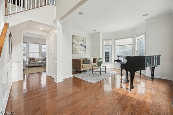 Fireplace, Interior, Living room, Piano, Recessed Lighting, Wood Texture Flooring