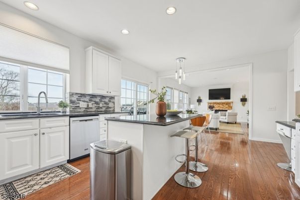 Dining room, Fireplace, Interior, Kitchen, Living room, Pendant Lights, Recessed Lighting, Wood Texture Flooring