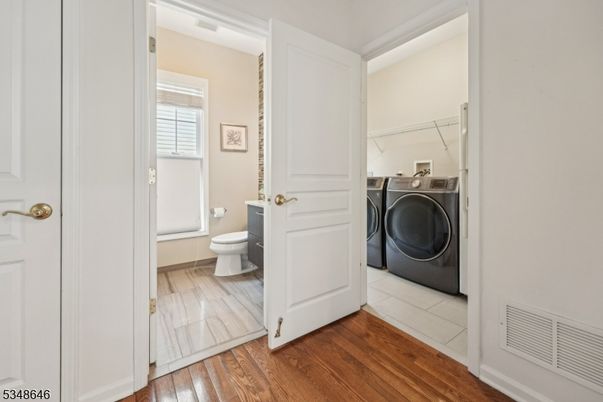 Bathroom, Interior, Utility Closets, Washer, Wood Texture Flooring