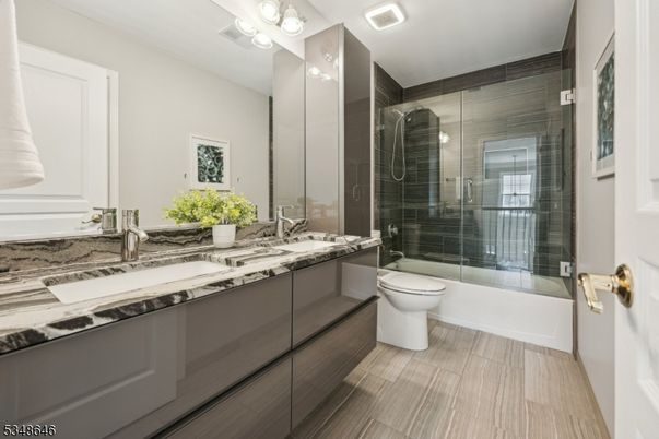 Bathroom, Dual Sink Vanities, Glass Shower, Interior, Wood Texture Flooring