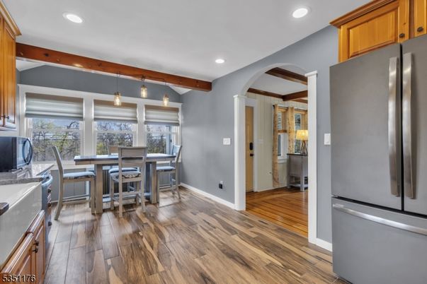 Dining room, Interior, Kitchen, Pendant Lights, Recessed Lighting, Stainless Steel Appliances, Wooden Beams, Wood Texture Flooring
