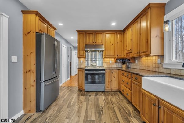 Interior, Kitchen, Recessed Lighting, Tile Countertops, Wood Texture Flooring