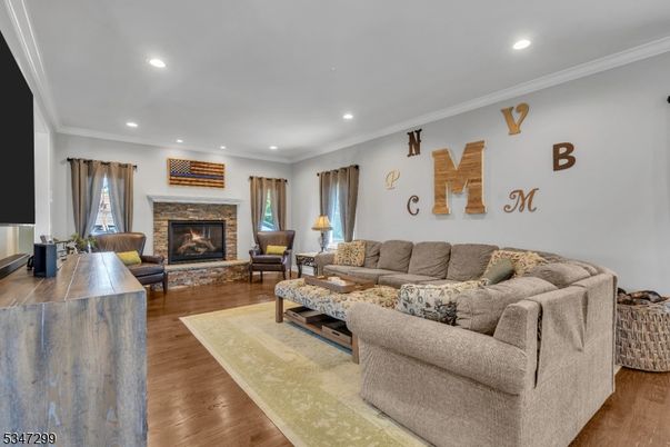 Fireplace, Interior, Living room, Recessed Lighting, Wood Texture Flooring