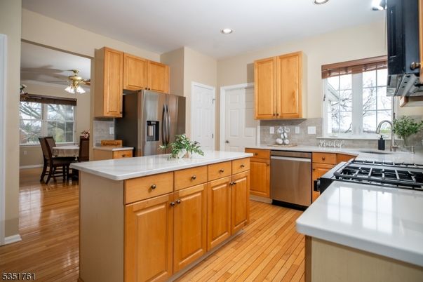 Dining room, Interior, Kitchen, Recessed Lighting, Stainless Steel Appliances, Wood Texture Flooring