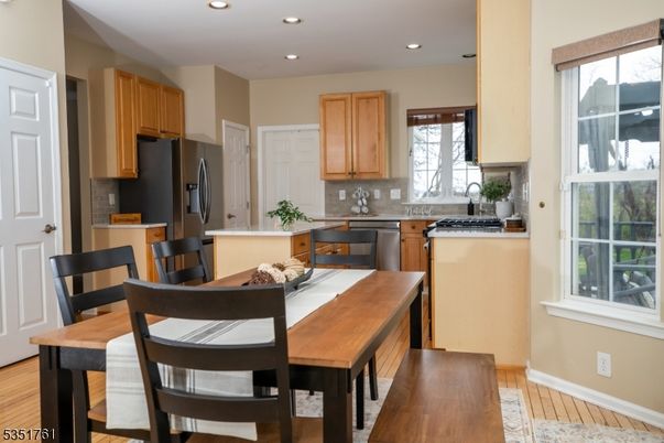 Dining room, Interior, Kitchen, Recessed Lighting, Stainless Steel Appliances, Wood Texture Flooring