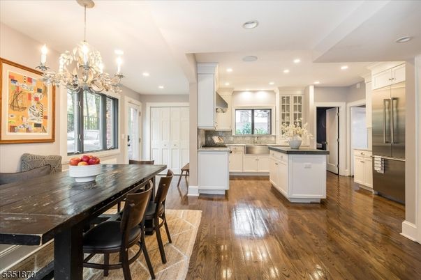 Chandelier, Dining room, Interior, Kitchen, Recessed Lighting, Stainless Steel Appliances, Wood Texture Flooring