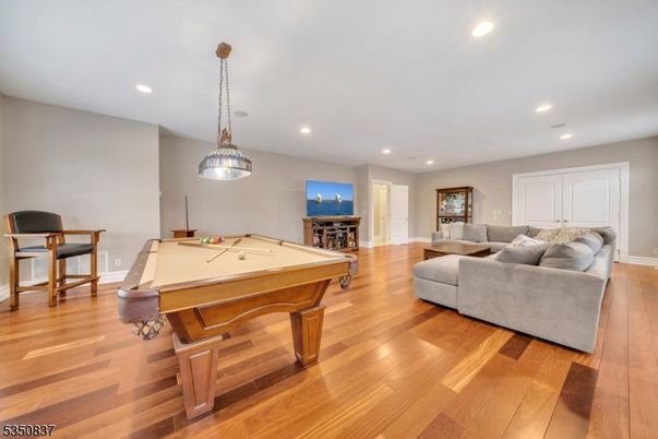 Billiard Table, Game Room, Interior, Living room, Pendant Lights, Recessed Lighting, Wood Texture Flooring