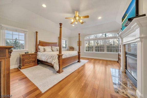 Bedroom, Fireplace, Interior, Recessed Lighting, Wood Texture Flooring