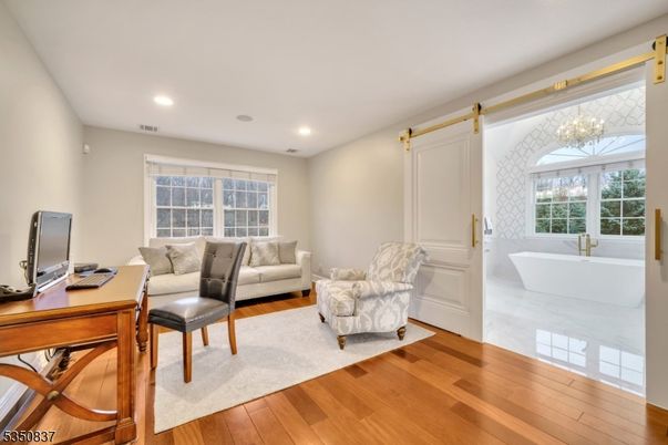 Bathroom, Chandelier, Free Standing Baths, Home Office, Interior, Recessed Lighting, Wood Texture Flooring