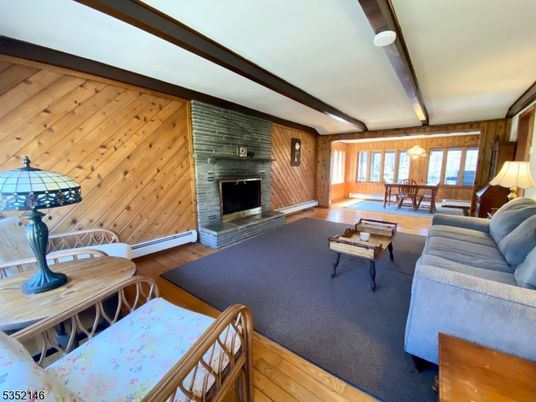 Dining room, Fireplace, Interior, Living room, Stone Walls, Wooden Beams, Wood Texture Flooring, Wooden Walls