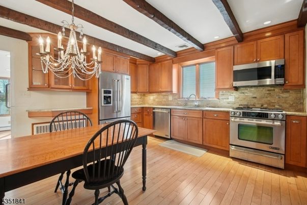Chandelier, Interior, Kitchen, Recessed Lighting, Stainless Steel Appliances, Wooden Beams, Wood Texture Flooring