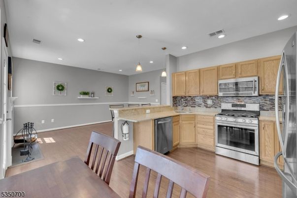Interior, Kitchen, Pendant Lights, Recessed Lighting, Stainless Steel Appliances, Wood Texture Flooring