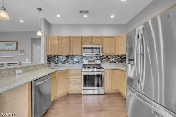 Interior, Kitchen, Pendant Lights, Recessed Lighting, Stainless Steel Appliances, Wood Texture Flooring