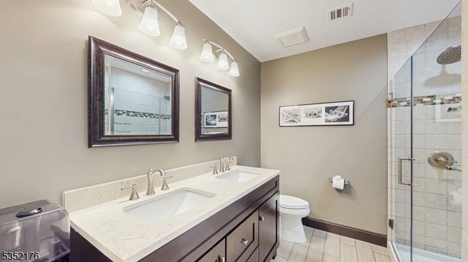 Bathroom, Dual Sink Vanities, Glass Shower, Interior, Wood Texture Flooring