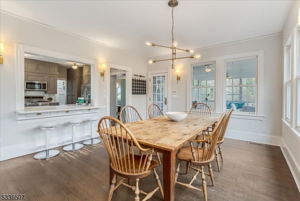 Dining room, Interior, Kitchen, Pendant Lights, Stainless Steel Appliances, Wood Texture Flooring