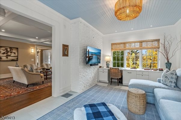 Chandelier, Interior, Living room, Recessed Lighting, Stone Walls, Wood Texture Flooring