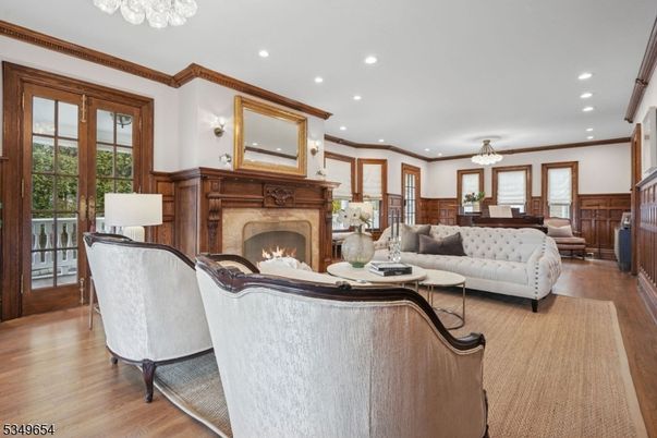 Chandelier, Dining room, Fireplace, Interior, Living room, Recessed Lighting, Wood Texture Flooring