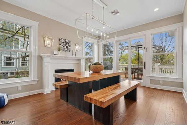 Dining room, Fireplace, Interior, Pendant Lights, Recessed Lighting, Wood Texture Flooring