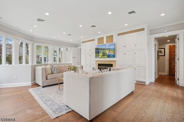 Fireplace, Interior, Living room, Recessed Lighting, Wood Texture Flooring