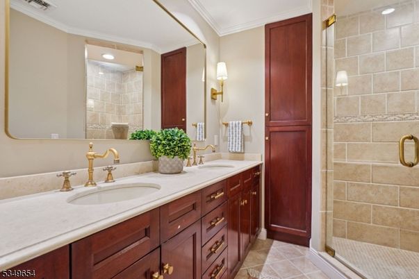 Bathroom, Dual Sink Vanities, Glass Shower, Interior, Recessed Lighting, Stone Walls