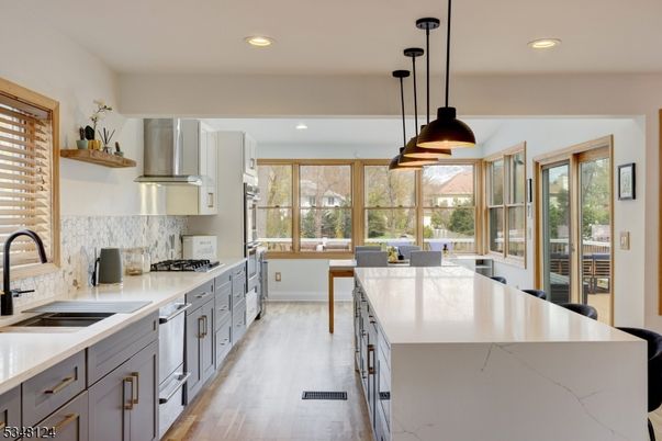 Dining room, Interior, Kitchen, Pendant Lights, Recessed Lighting, Stainless Steel Appliances, Wood Texture Flooring