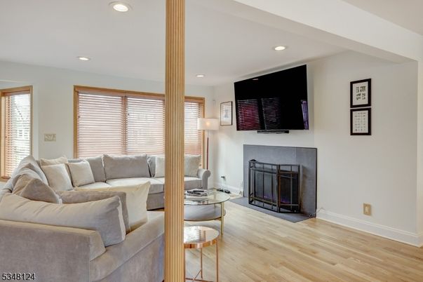 Fireplace, Interior, Living room, Recessed Lighting, Wood Texture Flooring